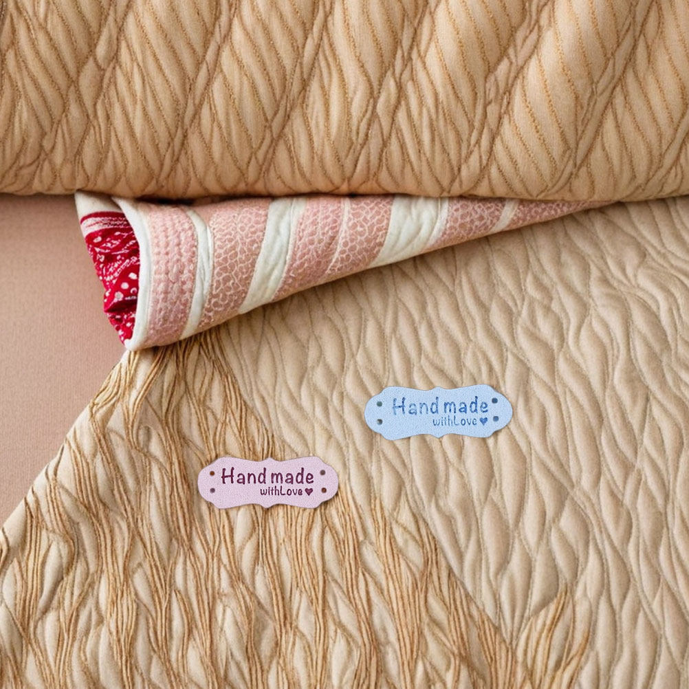 Sewing Label - 100 stuks handgemaakte reliëf suède labels